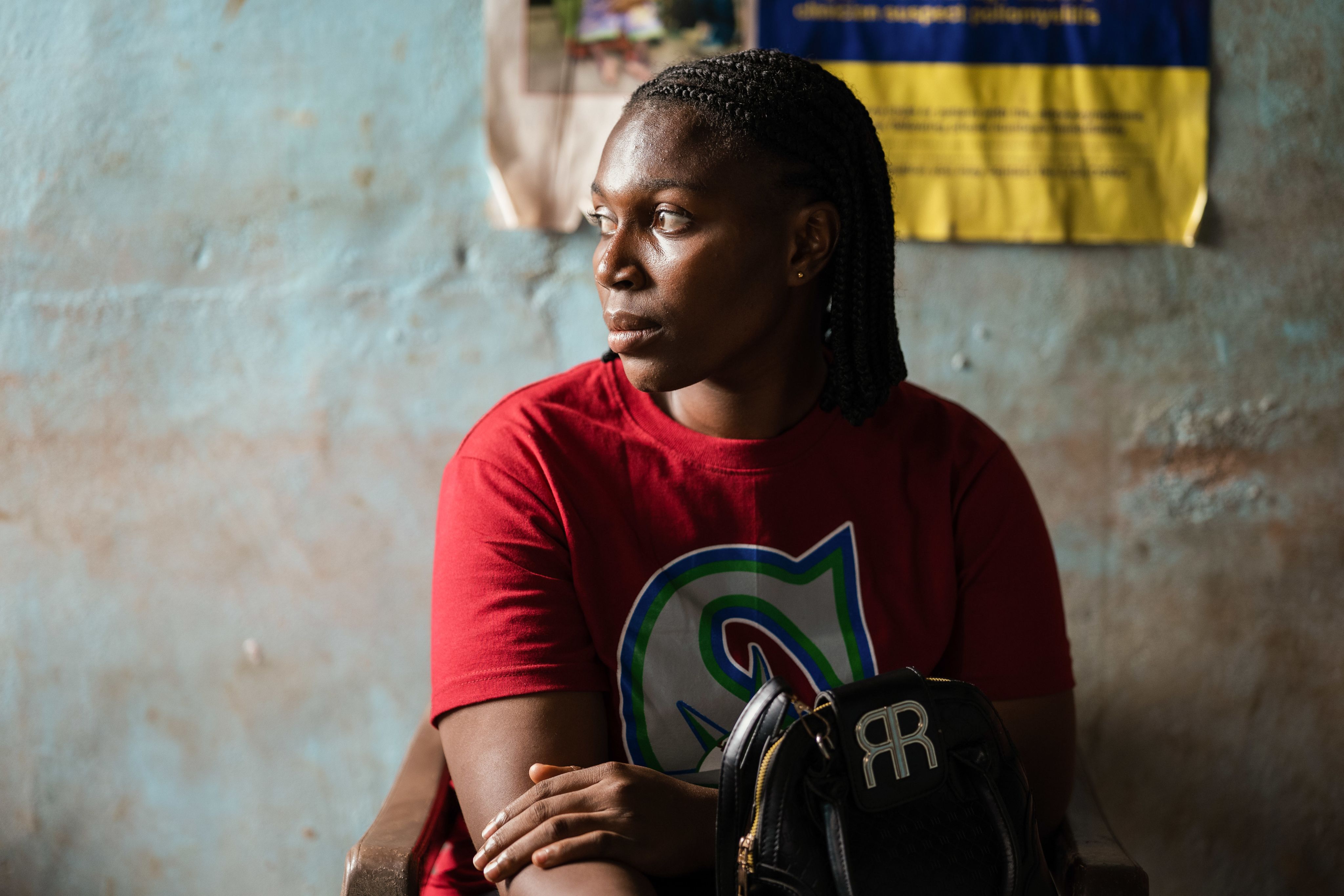 MSI client Adadechei looks to the side, wearing a red shirt