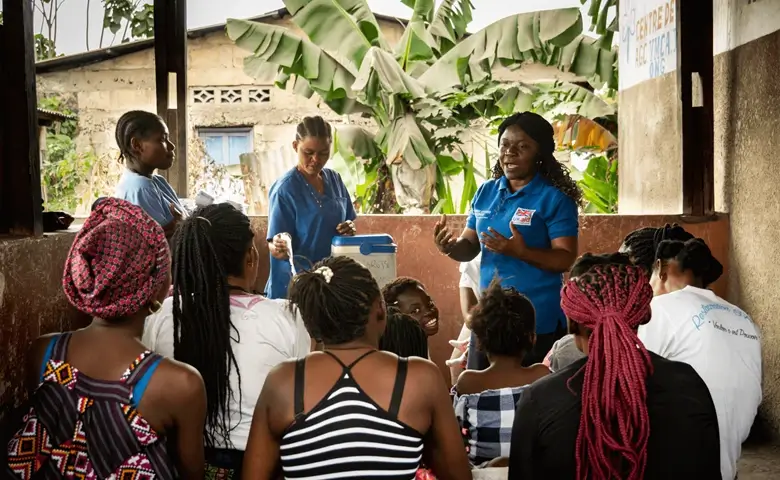 MSI employee talking to a group of women