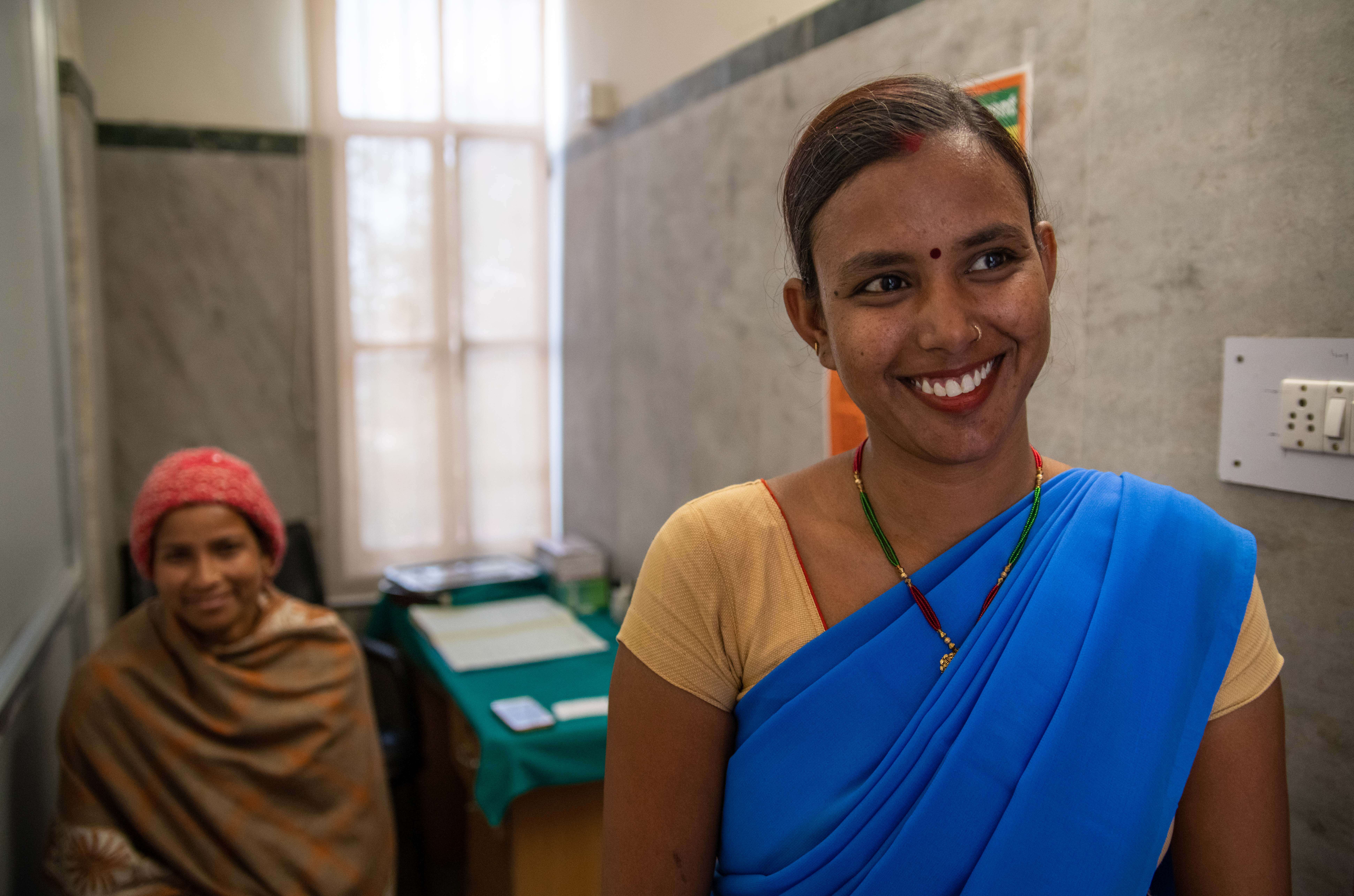 2020- pooja_ 24-year-old_ an ASHA didi _community worker_ smiles for a photo at the MSI clinic in Jaipur_ India (1) (1)